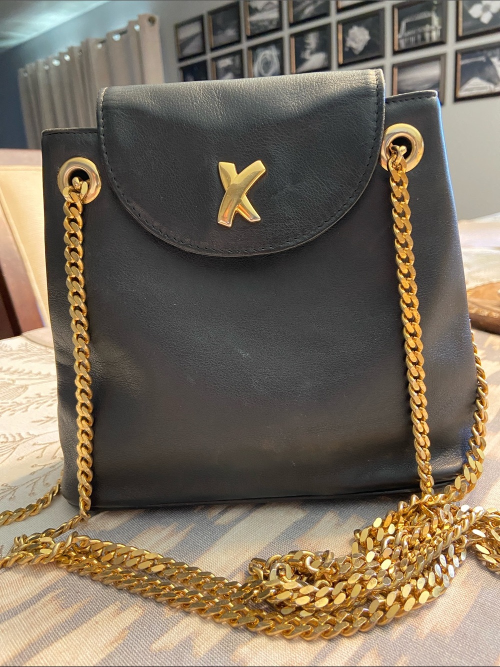 Black Leather Crossbody Bag with Gold Chain Detail